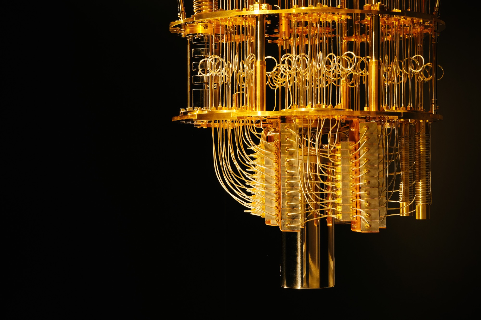 The gold-colored wiring and cooling stages inside an IBM quantum computer